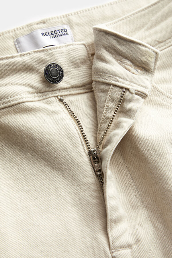 Off-white slim-fit jeans for men. 6