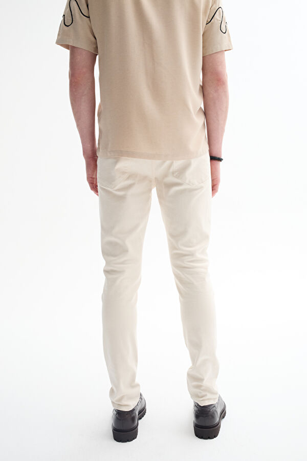 Off-white slim-fit jeans for men. 3