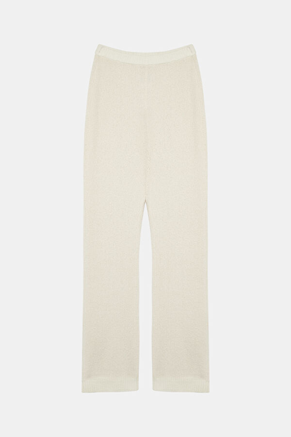 Off-white, straight-leg sports pants for women.