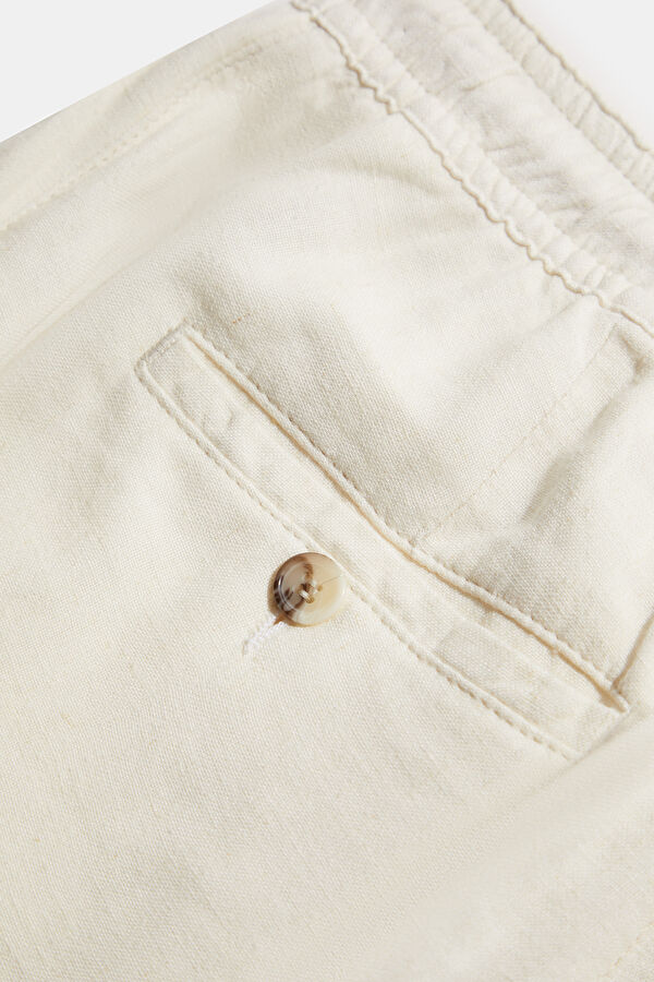 Off-white, straight-leg linen/viscose men's trousers. 5