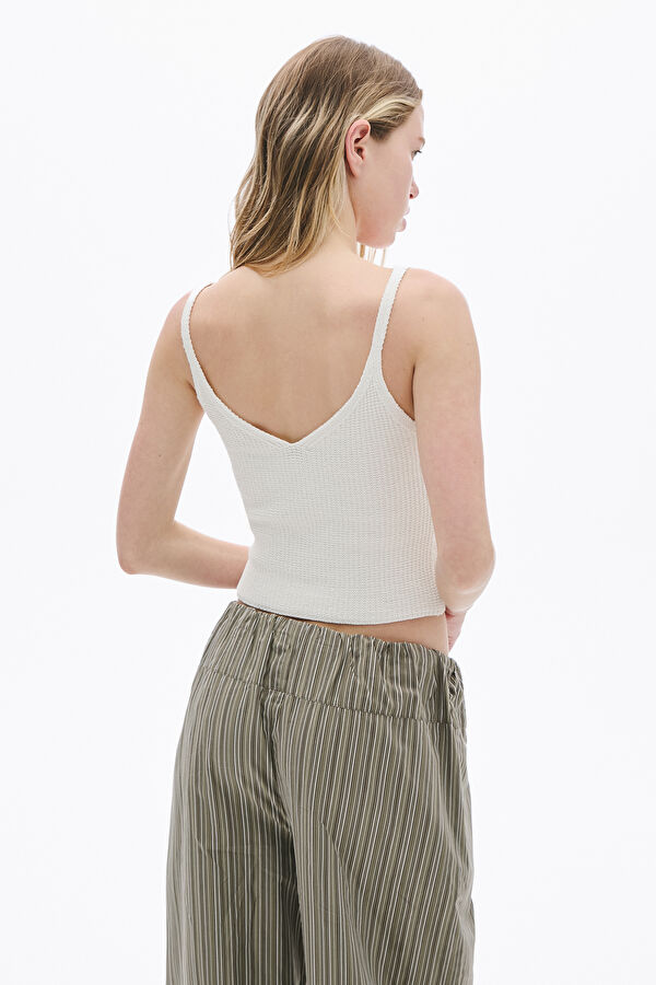 Off-white knitted sleeveless women's blouse 2