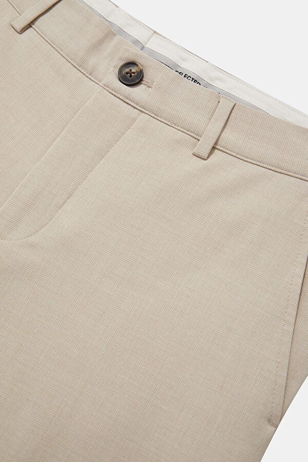 Cream-colored, straight-leg men's trousers. 3