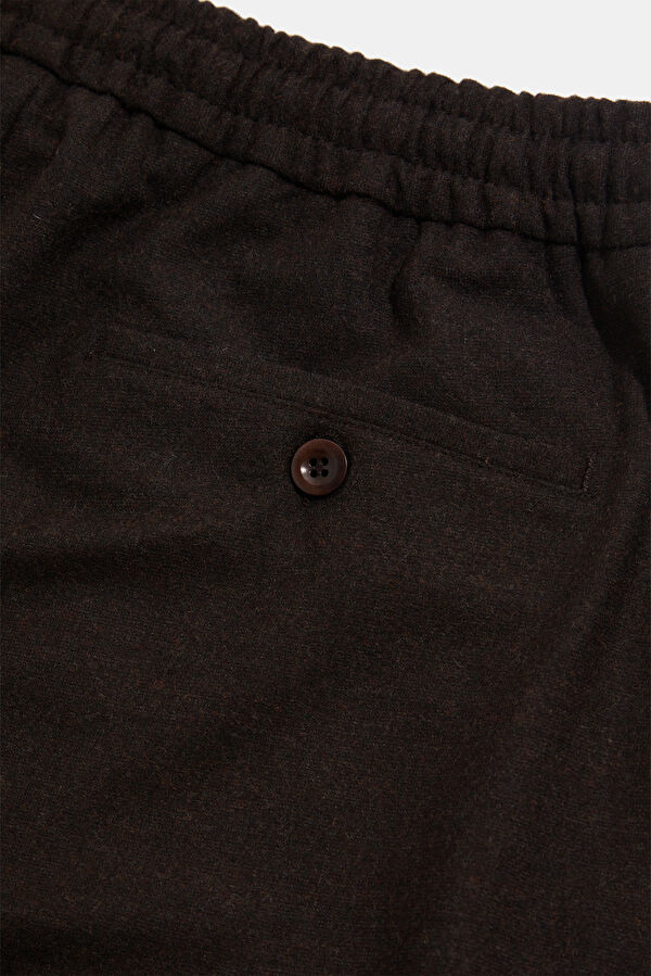 Coffee-colored, straight-leg men's trousers. 6